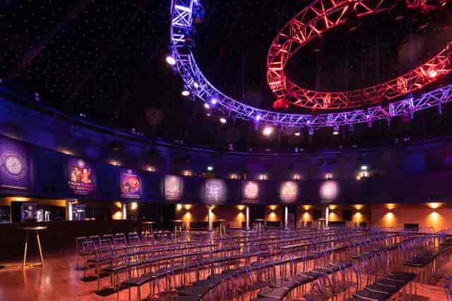Glass Room Suites: elegant event space with starry ceiling, perfect for presentations and performances.