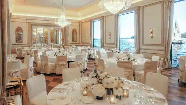 Elegant ballroom wedding venue with waterfront view