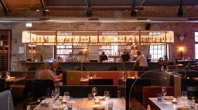 Stylish Bullerei restaurant with modern industrial design, ideal for upscale events and gatherings.