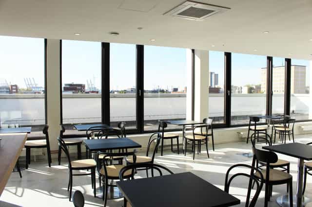 Thonet Rooftop Café event space with modern decor and urban views, perfect for networking.