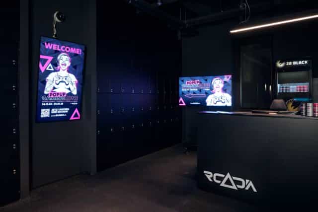 Modern Gaming Zone with digital signage, ideal for tech-focused interactive events.