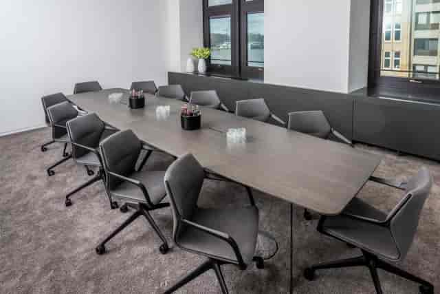 Modern boardroom for executive meetings, presentations, conferences.