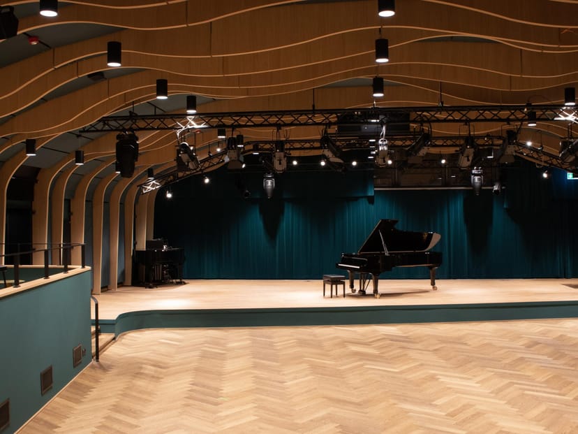 Modern concert hall, grand piano, jazz music event
