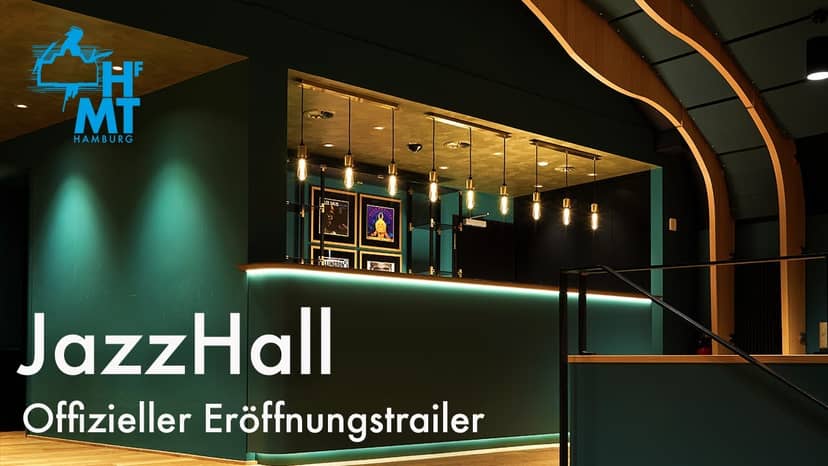 Jazz Hall venue, sleek reception, live music event