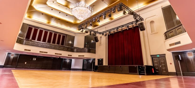 Curio Haus white hall ballroom stage banquet conference