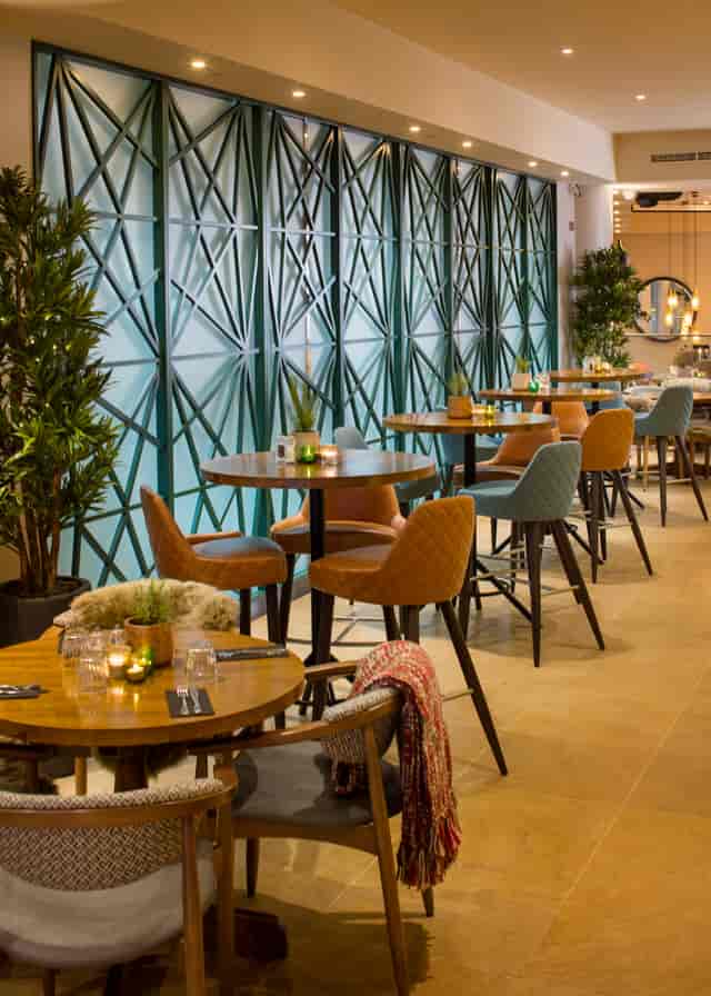 Stylish event space with modern decor, ideal for networking and gatherings.