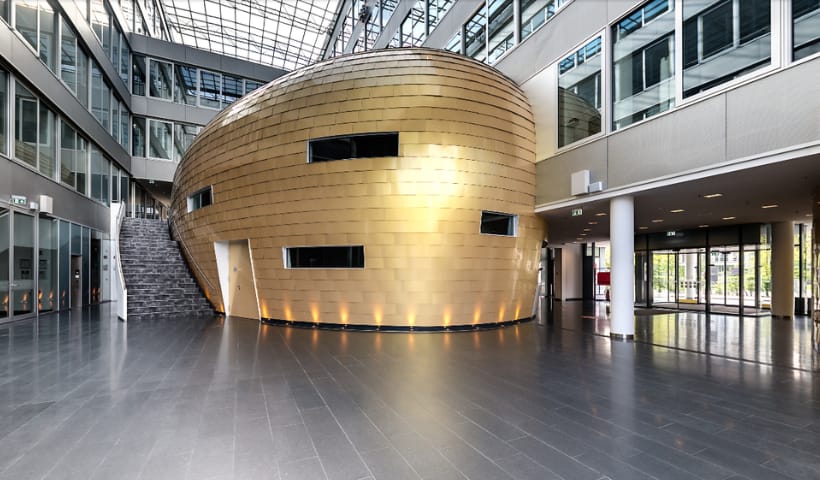 KLU Foyer modern gold pod conference venue