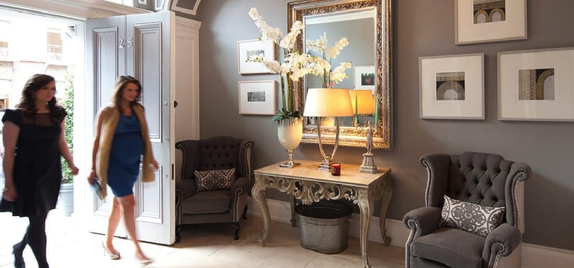 Elegant conference center entrance with stylish decor for high-end events and networking.