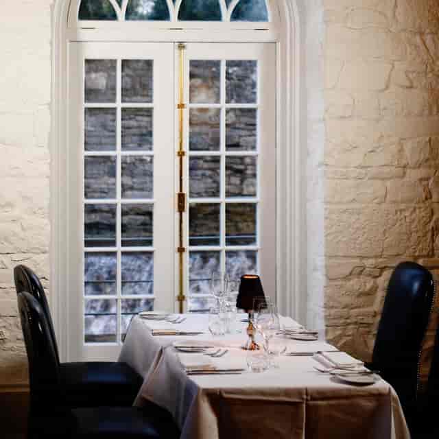 Elegant dining table at The Mill Restaurant, perfect for intimate gatherings and corporate events.