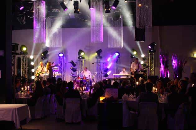 Corporate gala venue, live band, elegant dining, event
