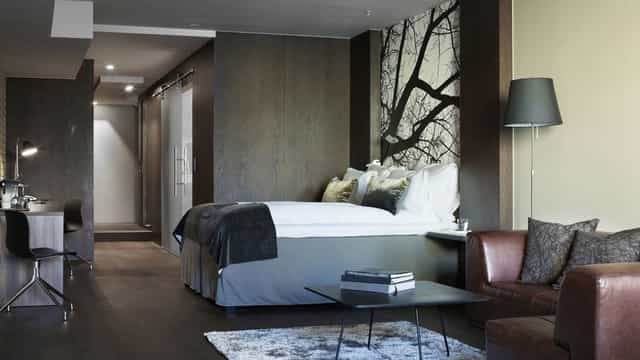 Modern Oslo hotel meeting suite, VIP retreat, executive event.