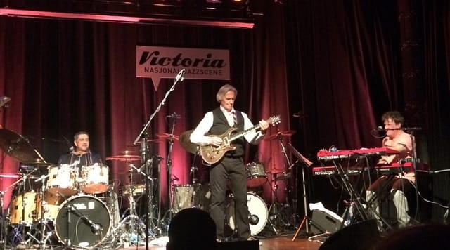 Jazz concert hall, intimate stage, corporate event, gala