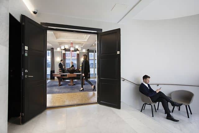 Conference center reception, modern lobby, corporate event, networking