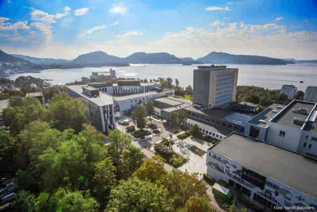 NHH campus seminar, modern buildings, green space, business event, academic conference