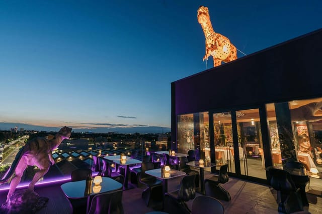 Dinosaur-themed rooftop suites: unique party & event venue