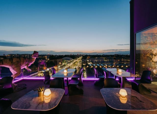 Dino-themed suite, rooftop venue, cocktail event, city view