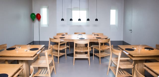 Modern Restaurant D'O, oval table, corporate event, reception