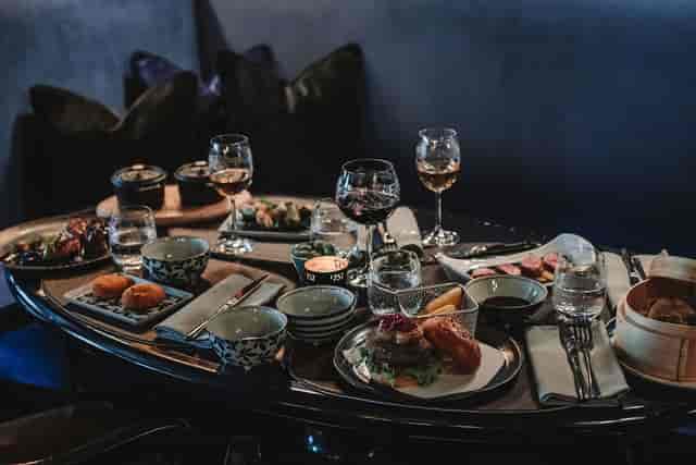 Elegant catering setup, VIP lounge, executive dinner, sushi, burgers