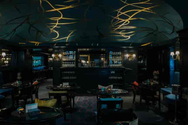 Luxury cocktail bar Cavour, opulent ceiling, event venue