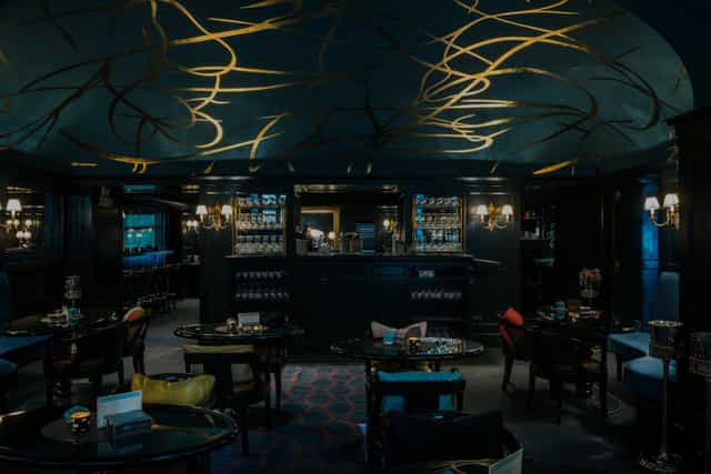 Luxury cocktail bar Cavour, opulent ceiling, event venue