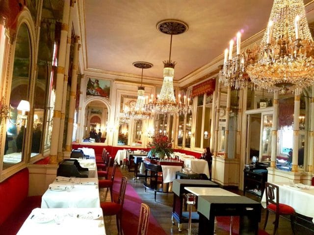 Gilded event hall, crystal chandeliers, corporate gala, private party