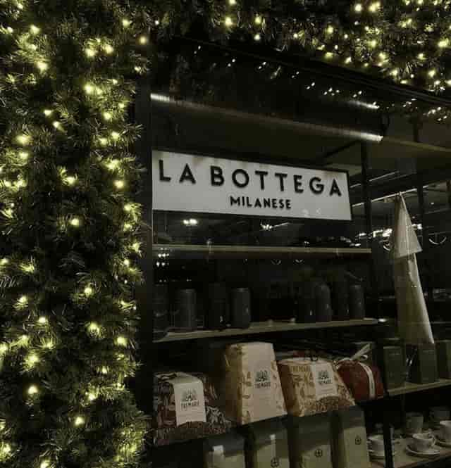 La Bottega Milanese holiday event, stylish bar, festive Christmas tree