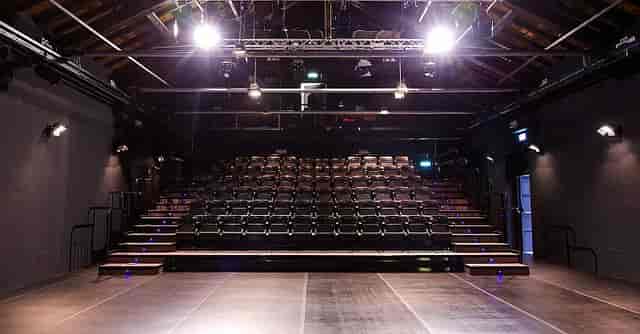 Milan black box theatre, tiered seating, conference event