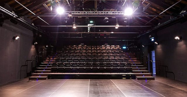 Milan black box theatre, tiered seating, conference event