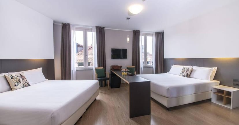 Sempione Hotel suite, dual queen beds, executive event, VIP lodging
