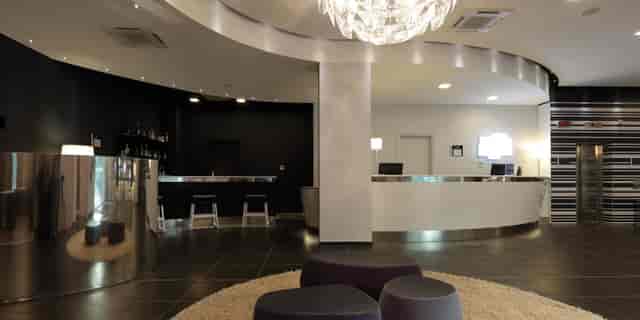 Modern hotel lobby bar reception Milan event networking