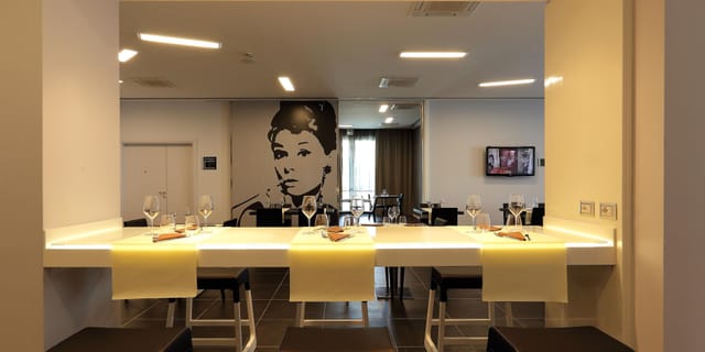 Milan Holiday Inn VIP dinner & networking Audrey Hepburn mural