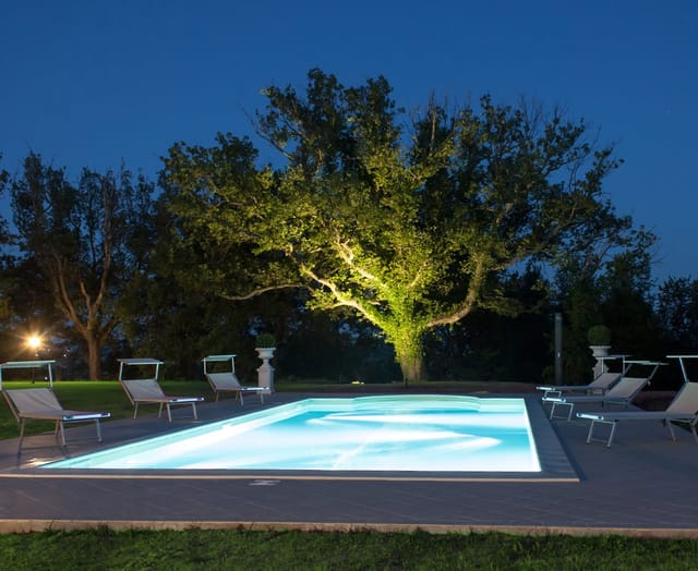 Villa Nena holiday home: pool, trees, evening event venue