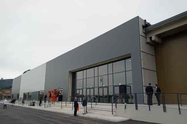 Modern convention center, glass entrance, trade show, conference venue