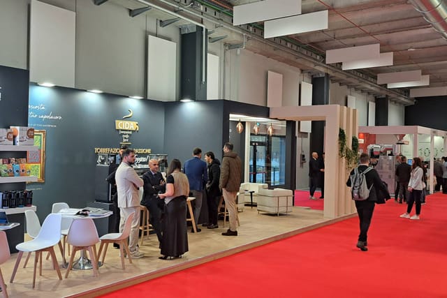 Sala Margherita Hack trade show booth, red carpet, networking