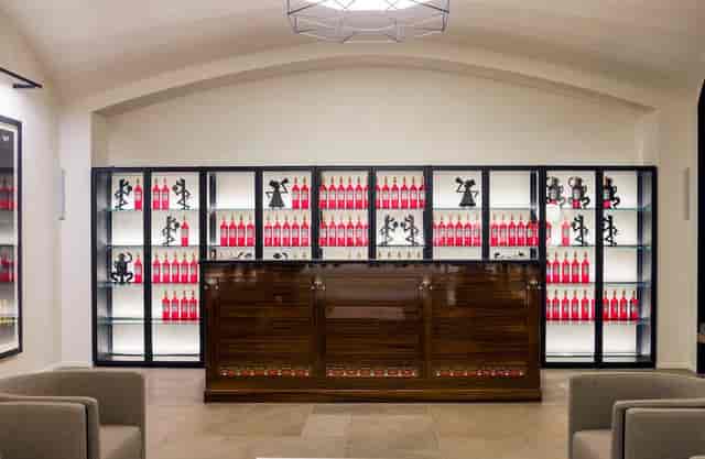 Campari cocktail reception bar, illuminated bottles