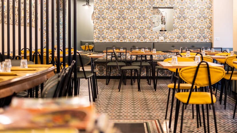 Milano Sarpi event space: yellow chairs, modern, stylish, networking