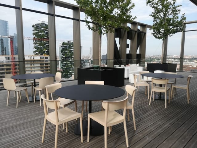 Rooftop terrace bar, urban, cocktail, networking event.