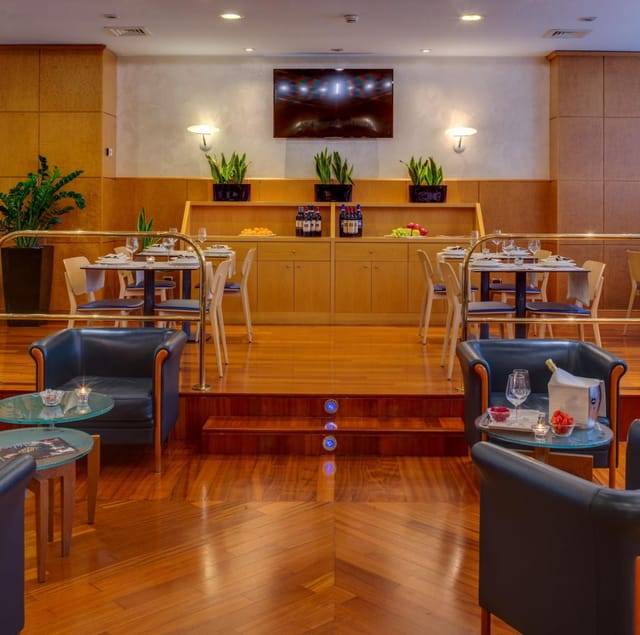 Italian restaurant reception, tiered seating, wood tones