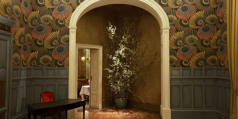 Cracco Ristorante wine cellar event entrance, floral decor
