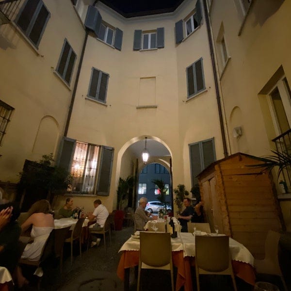 Osteria Fara wine bar courtyard, European ambiance, private event reception