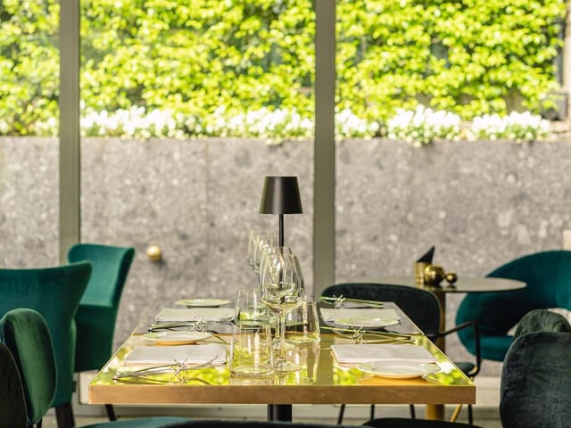 Elegant dining setup in Bianca Maria Palace Hotel gardens for intimate gatherings and corporate events.