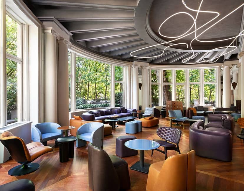 Stylish lounge for meetings at Sheraton Diana Majestic, Milan, ideal for networking events.