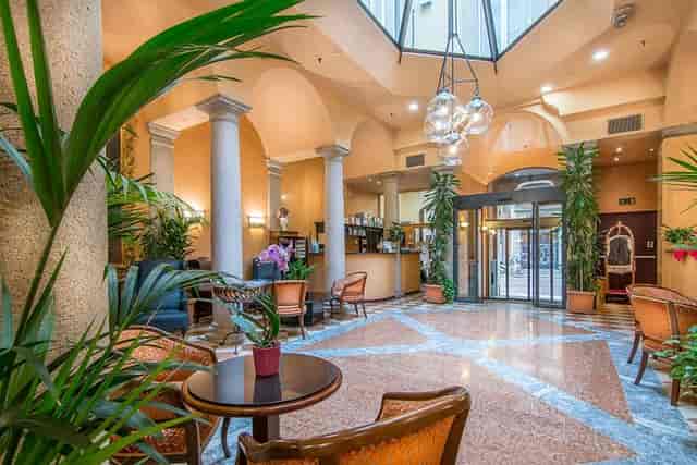 Meeting Room at Hotel Regina with elegant decor for conferences and events.