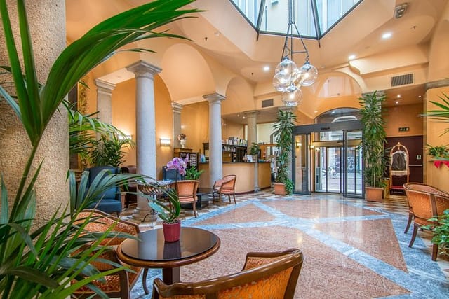 Meeting Room at Hotel Regina with elegant decor for conferences and events.