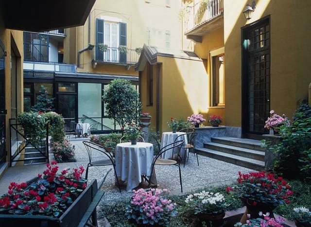 Milan courtyard event, floral, boutique hotel reception