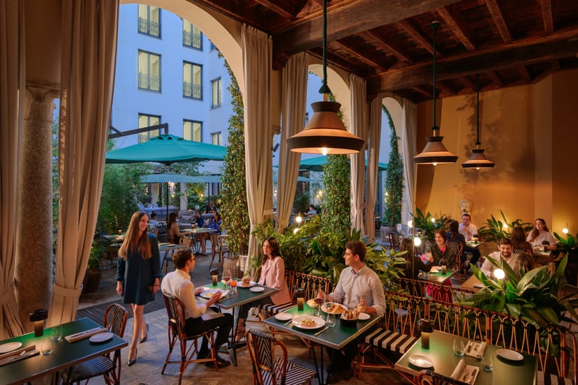Milan Loggia corporate event greenery lighting