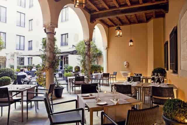 Elegant outdoor dining area at Loggia, Mandarin Oriental Milan for stylish events.