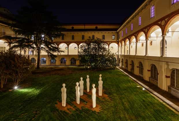 Milan museum courtyard event space, arches, sculptures