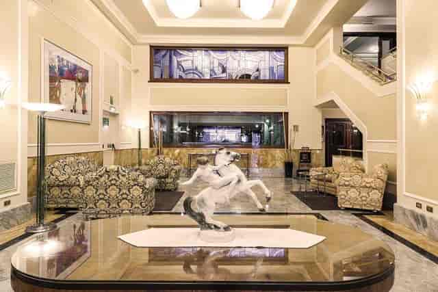 Elegant Doria Grand Hotel lobby, marble flooring, ideal for conferences and receptions.