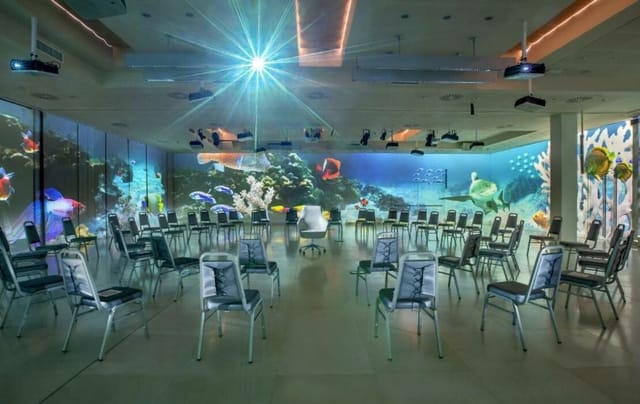 Enterprise Hotel Event: Circular Seating, Full-Room Projection